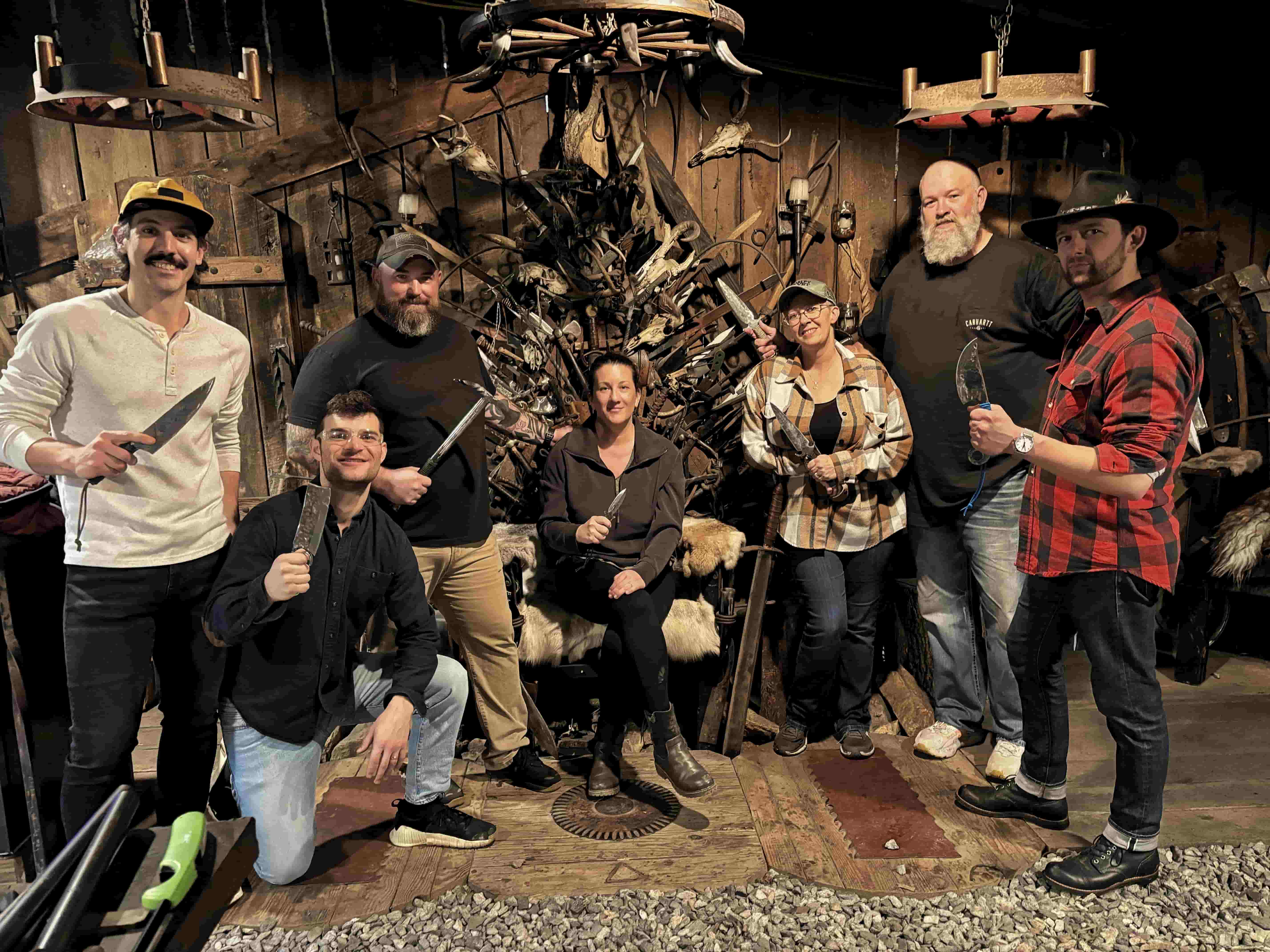 Group of guests with their forged blades at Vikings Don't Cry